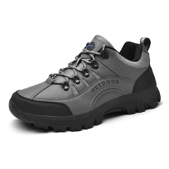 Bovenaanzicht van de herenschoenen/damesschoenen die orthopedische steun bieden voor actieve levensstijl.