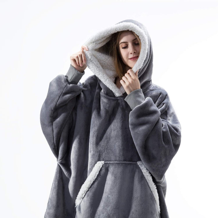 Heerlijke oversized deken hoodie, zacht fleece voor extra warmte en gemak.