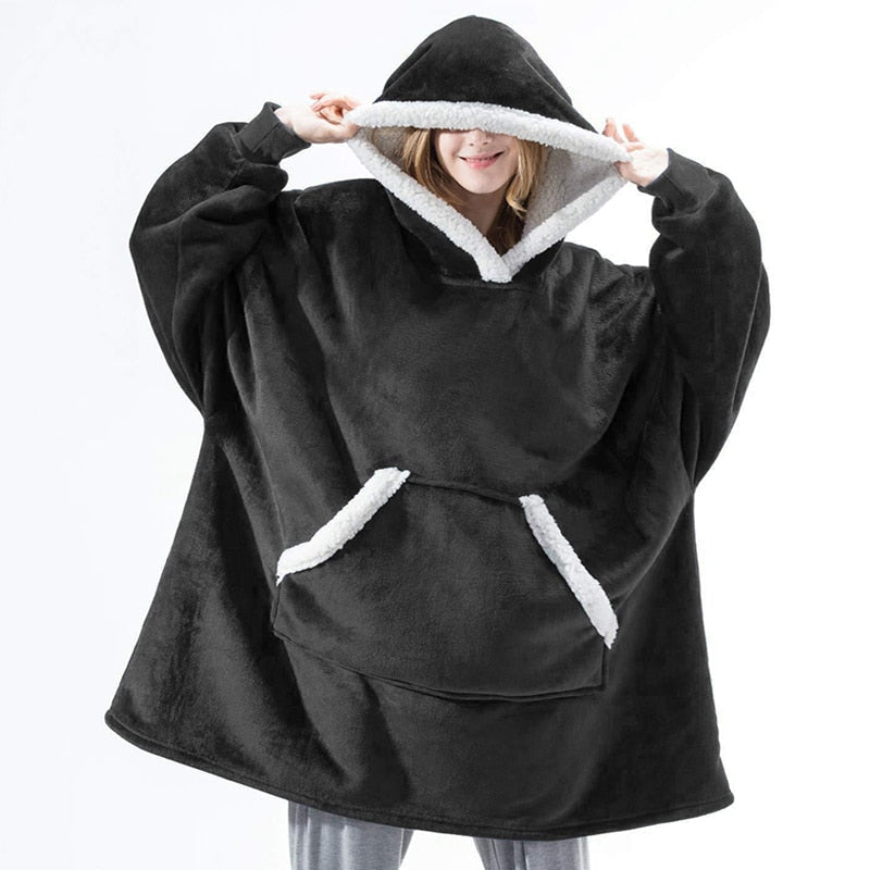 Jouw persoonlijke warmtebron: de unisex oversized hoodie deken.