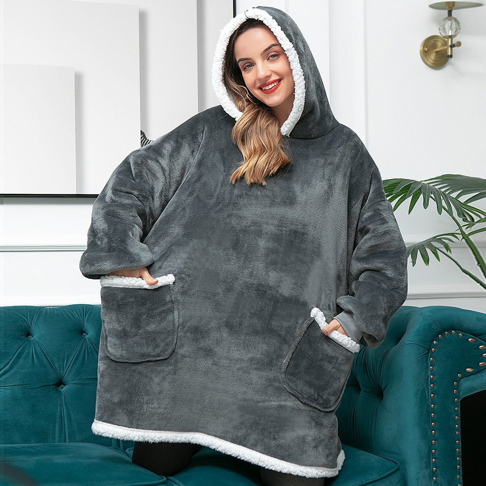 De gezelligste oversized plaid met capuchon, jouw comfort zone.