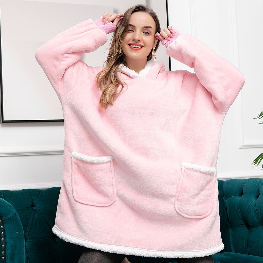 Praktisch en stijlvol: de unisex oversized hoodie deken.