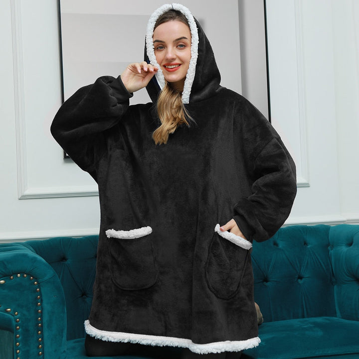 Ultieme warmte en comfort met deze zachte, oversized hoodie deken.