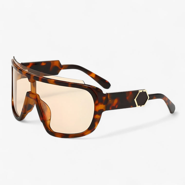 Monoblock zonnebril met UV400 bescherming, unisex en oversized design voor optimale oogbescherming in de zomer.
