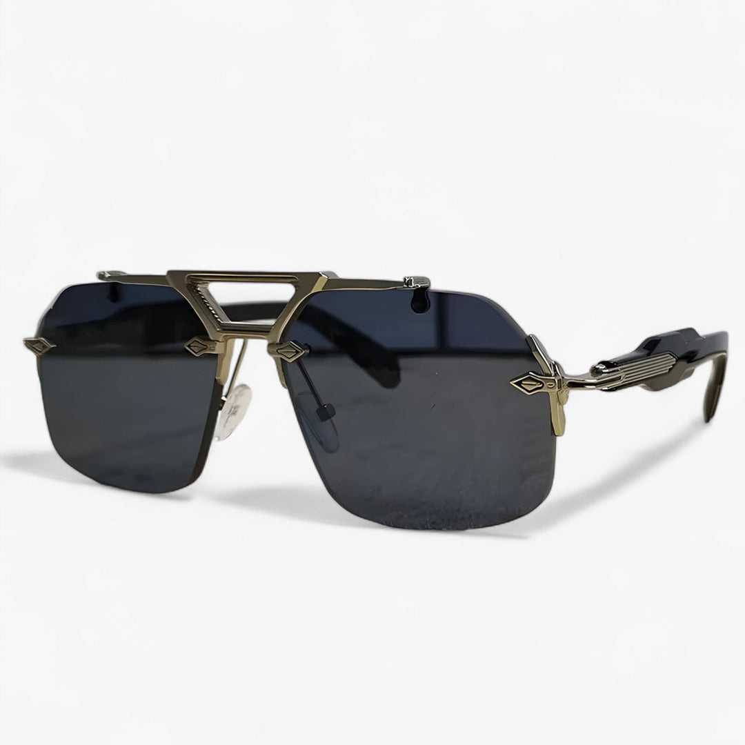Unisex randloze oversized zonnebril met metalen accenten, trendy voor streetwear en festivals.