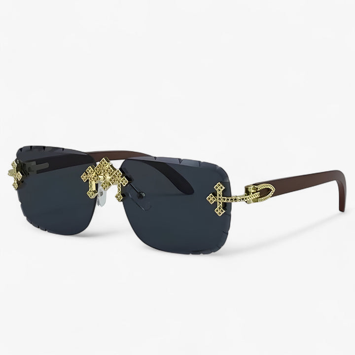 Close-up van een randloze steampunk zonnebril met gedetailleerde metalen accenten en spiegelende glazen.