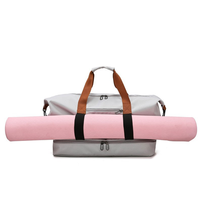 Grote, zwarte unisex reistas met handvatten en schouderband voor sport & vakantie.