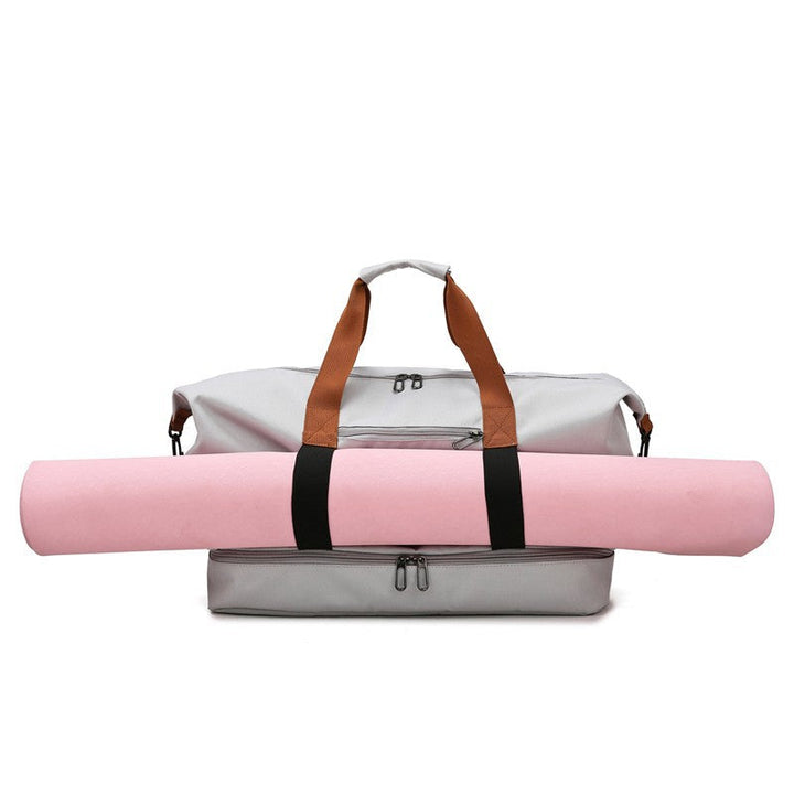 Grote, zwarte unisex reistas met handvatten en schouderband voor sport & vakantie.