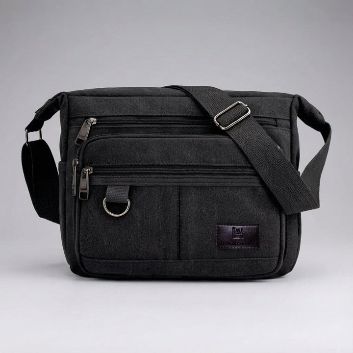 Duurzame unisex canvas tas met RFID, functioneel als werktas of schoudertas voor pendelaars en reizigers.