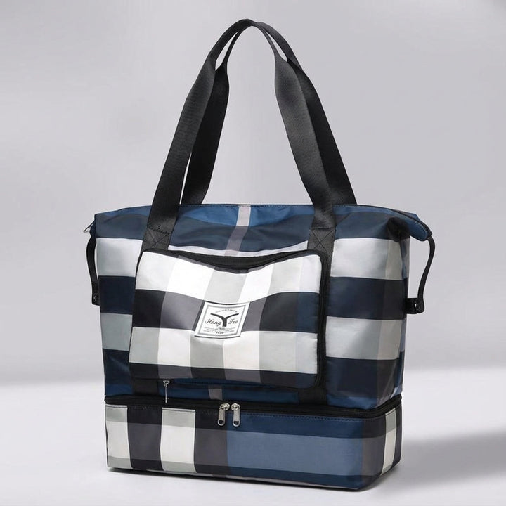 Detailfoto Bagloria weekendtas met geopend bodemvak, perfect voor schoenen of natte kleding.