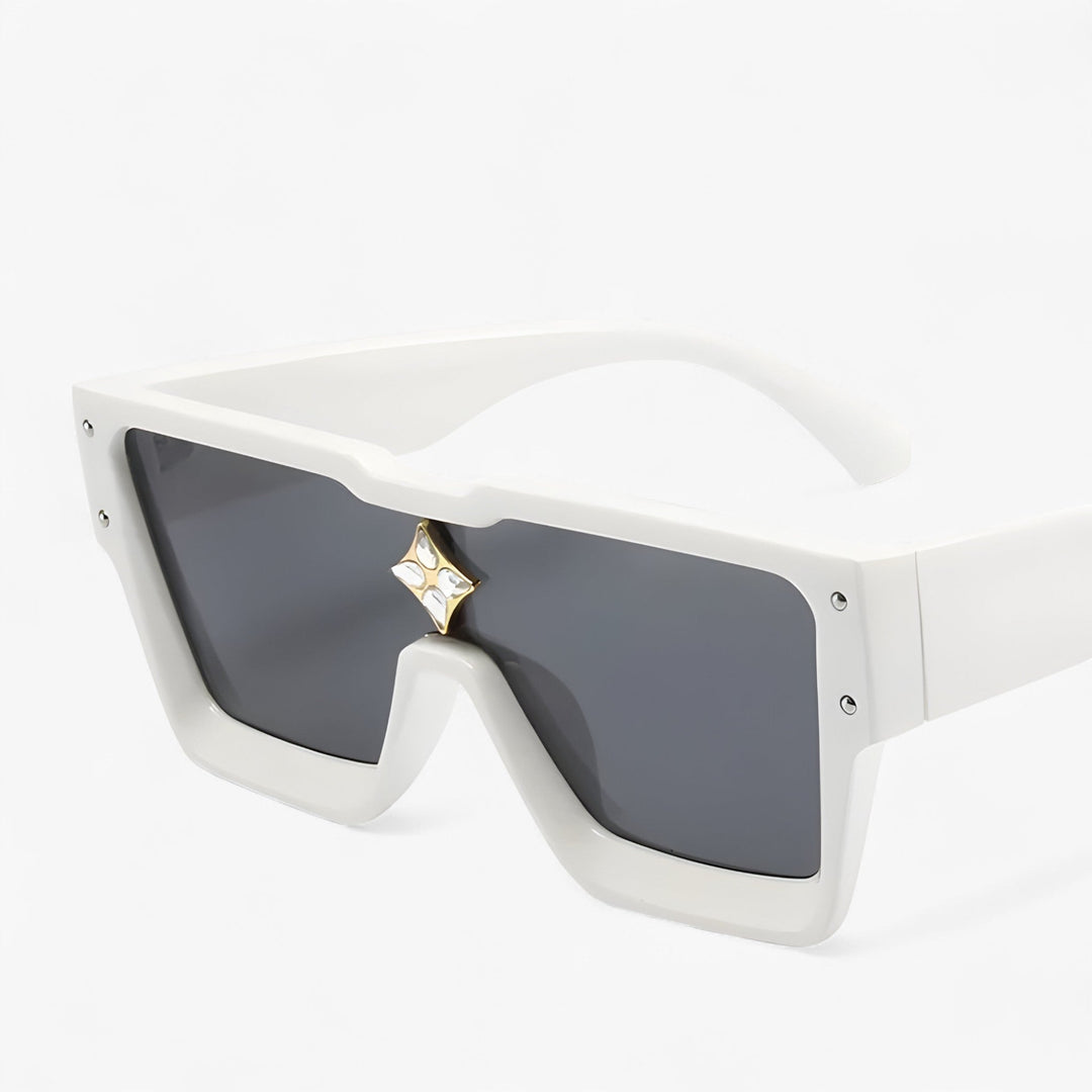 Gedurfde spiegelende punk zonnebril, unisex model. Perfect voor een streetwear statement met UV400 bescherming.