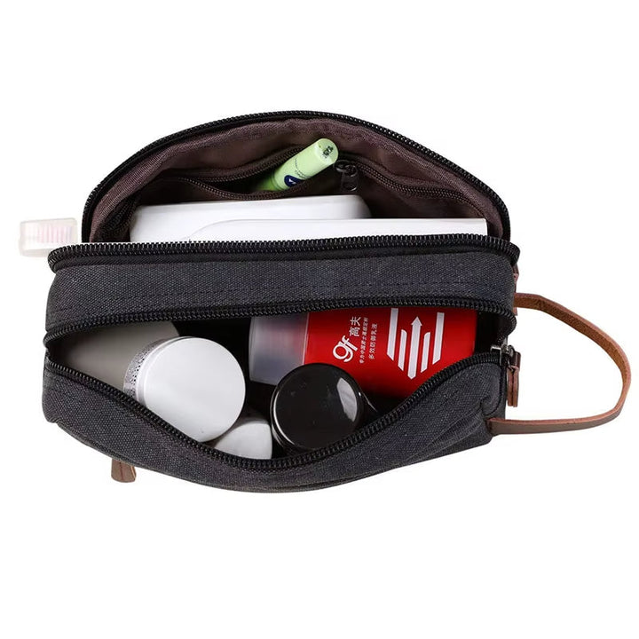 Waterdichte Tripelle reistoilettas, unisex met dubbel compartiment. Compact en veilig opbergen van al je reisbenodigdheden.