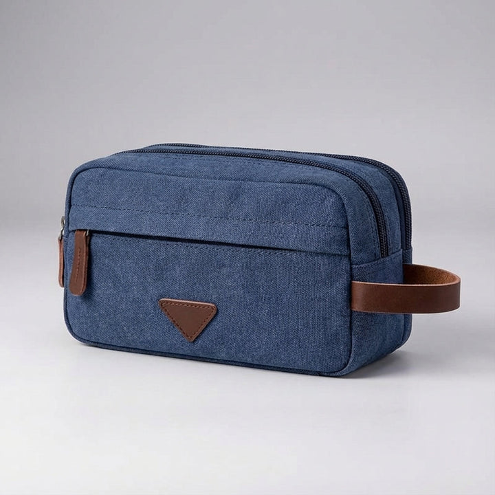 Tripelle dubbel compartiment toilettas, unisex en waterdicht. Gemaakt van stevig canvas voor al je reisorganisatiebehoeften.