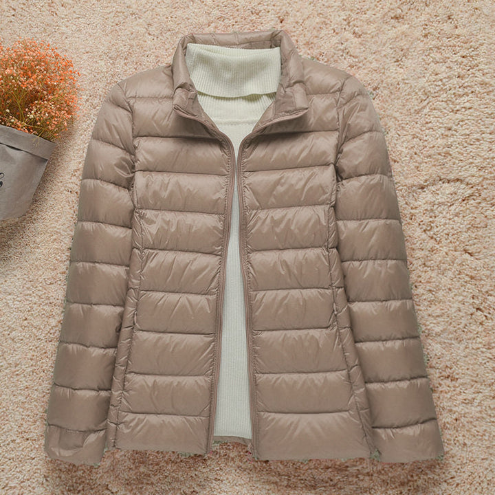Compact opvouwbare ultralichte unisex gewatteerde jas met capuchon, perfect voor reizen en outdoor.
