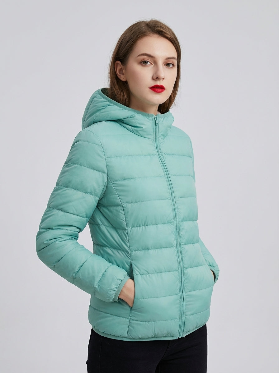 Warme, comfortabele unisex gewatteerde jas met capuchon, ideaal als tussenlaag in de winter.