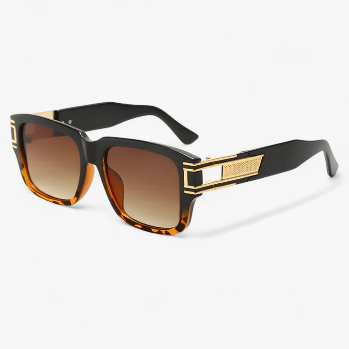 Stijlvolle unisex vierkante zonnebril met uniek druppeldetail. Perfect retro mode accessoire.