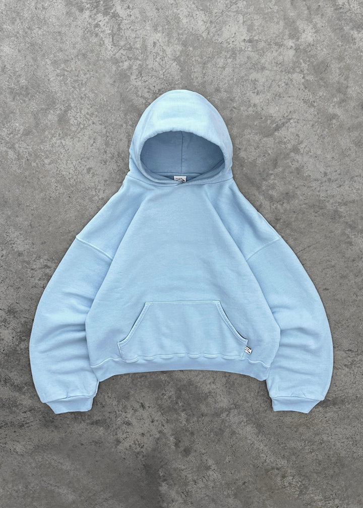 Zachte unisex capuchontrui in bordeauxrood, perfect voor een warme, casual look.