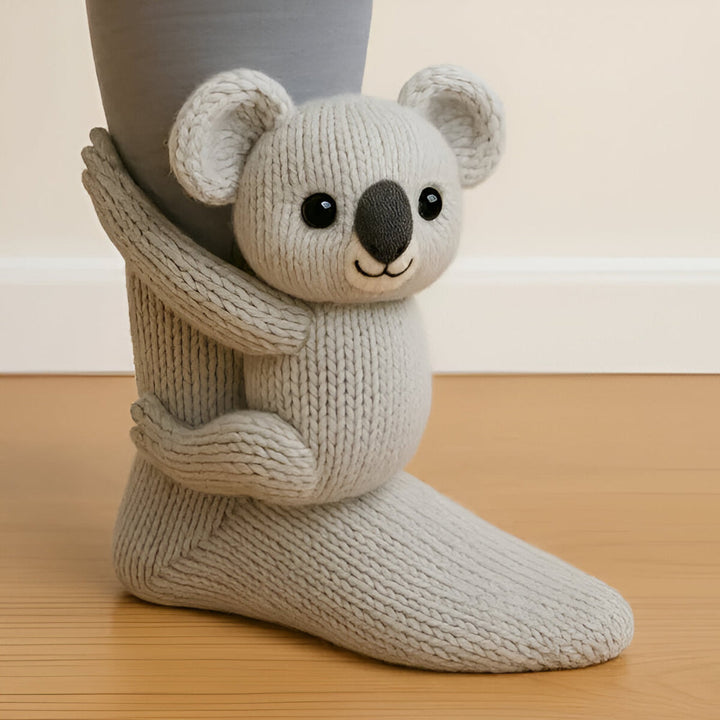 Detail van de zachte, warme stof van de 3D-dierensokken, perfect voor slaapsokken en comfort. Unisex.