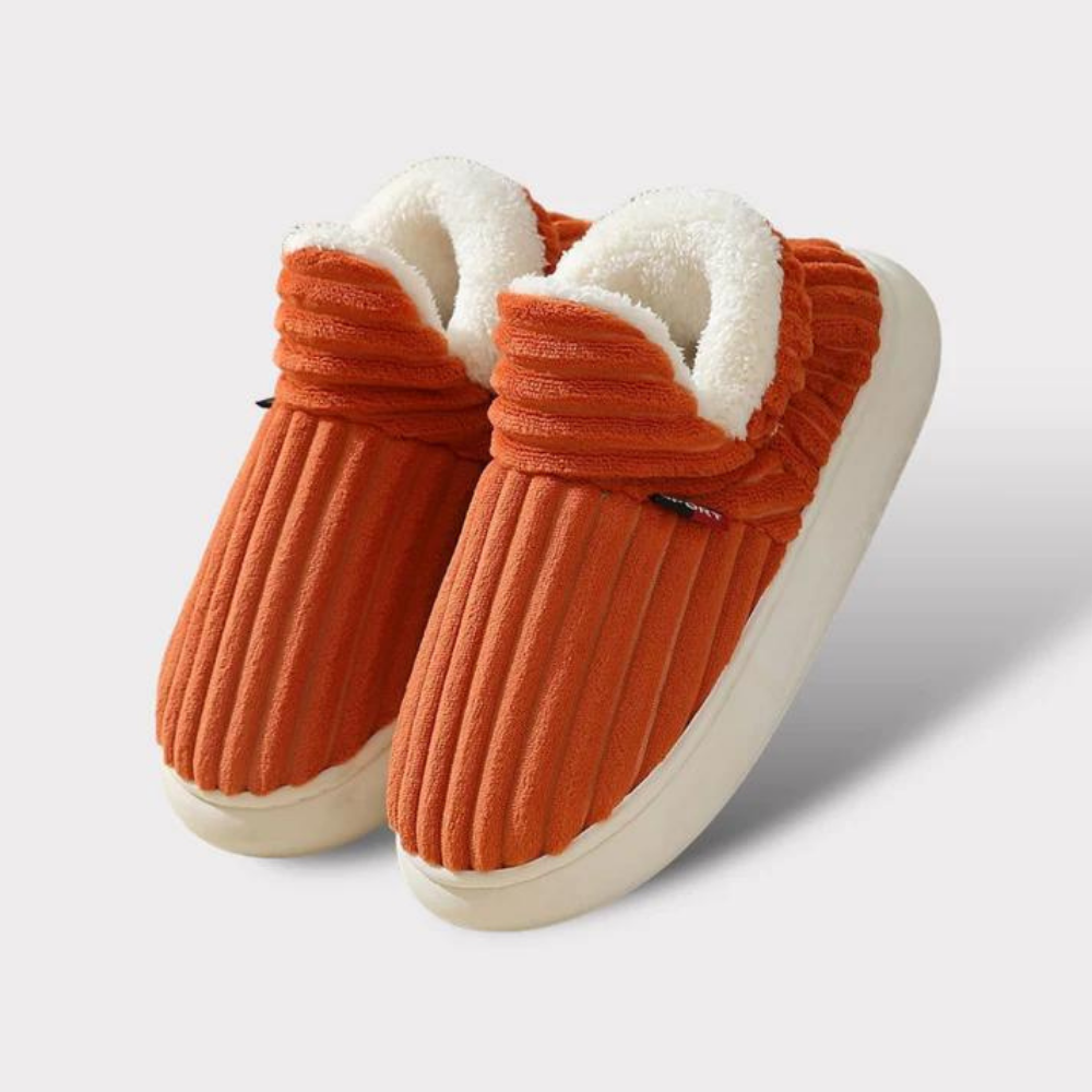 Stijlvolle unisex comfort pantoffels met een zachte voering en stevige antislipzool. Ideale warme huisschoenen.