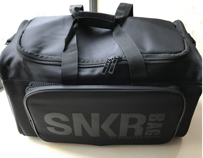 Weekender reistas unisex, waterbestendig met compartimenten voor schoenen en laptop.