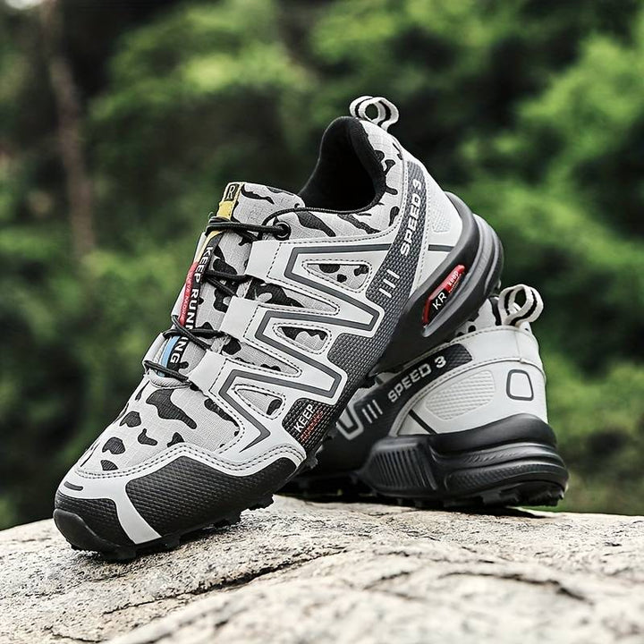 Duurzame unisex trekkingschoenen met waterdichte bescherming, ideaal voor lange wandelingen op elk terrein.