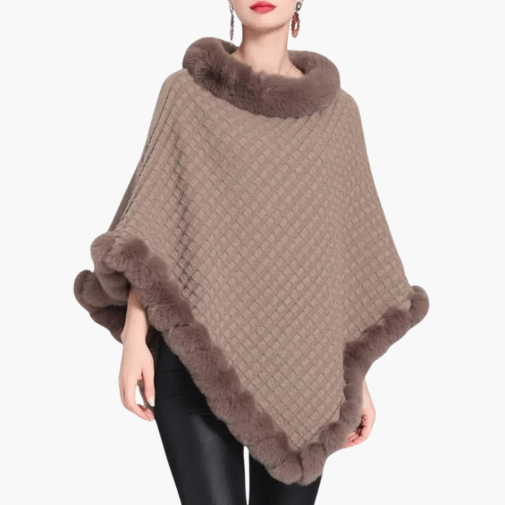 Chique oversized poncho voor dames, comfortabel gebreid met elegante nepbont kraag. Ideaal voor herfst/winter.