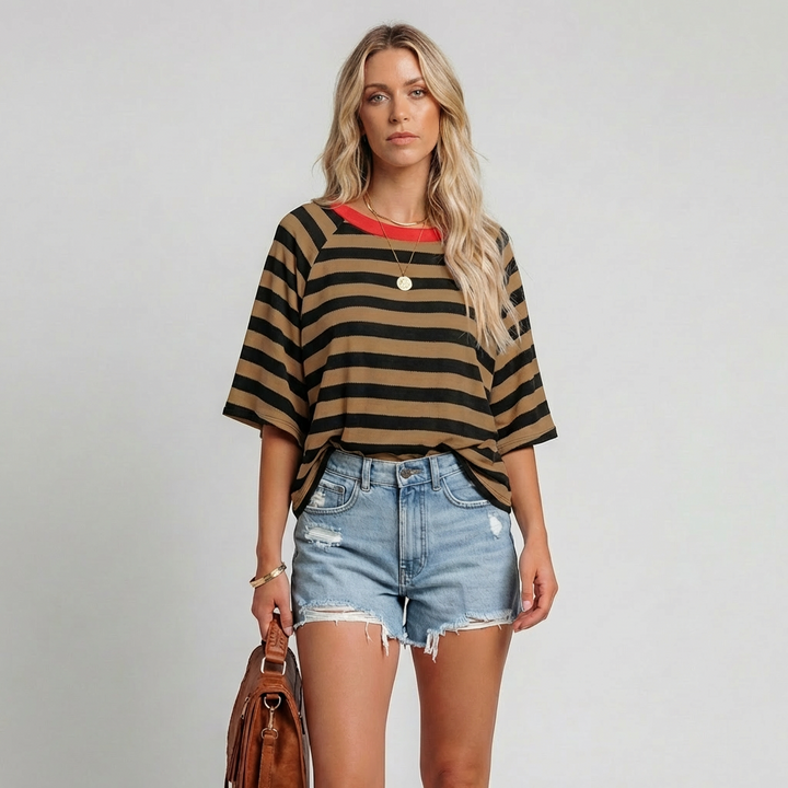 Vrouwen gestreepte crewneck top met kleurblok design en korte mouwen. Perfect voor een casual zomerse dag.