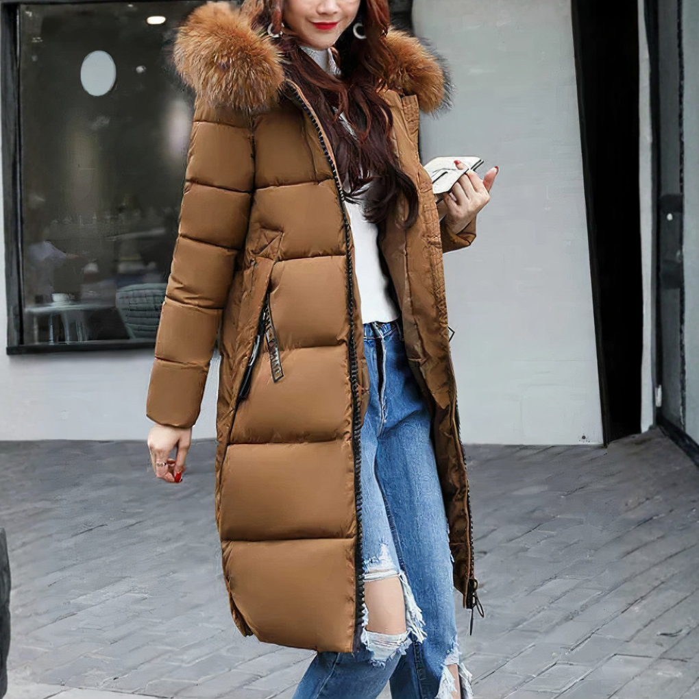 Elegante lange dames winterjas met zachte bontkraag. Ideale outwear mantel voor een stijlvolle look.