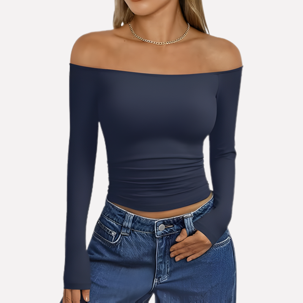 Comfortabele en veelzijdige off-the-shoulder damestop met lange mouwen, geschikt voor avond of dag.