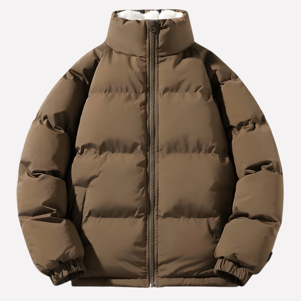 Warm dames pufferjack met zachte fleecevoering, capuchon en doorgestikt design voor wintercomfort.
