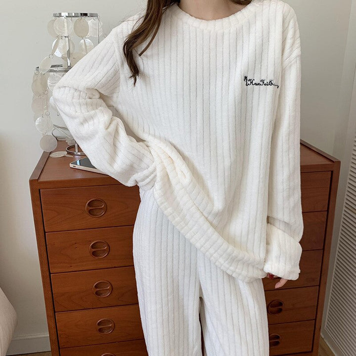 Gezellige koraalfleece dames loungewear set. Warm thuispak voor ultiem comfort en ontspanning.