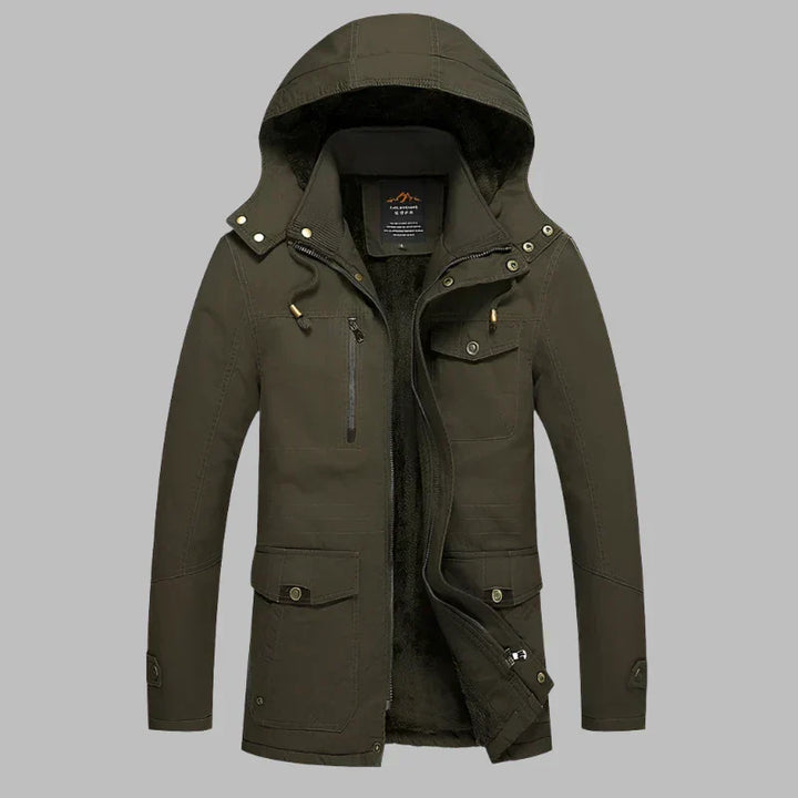 Waterdichte 'ArcticShield' heren winterjas met warme bontkraag, ontworpen voor comfort outdoor in de winter.