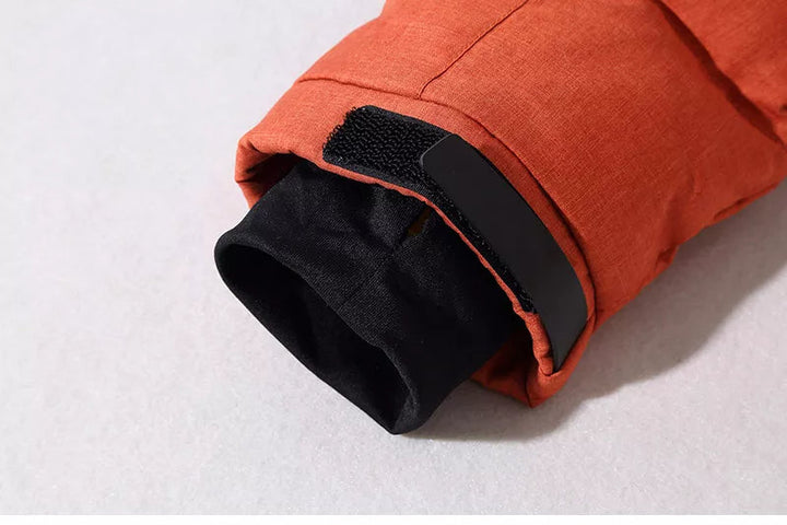 Veelzijdige grijze heren wintersportjas. Thermisch, winddicht en comfortabel voor elk winterweer.
