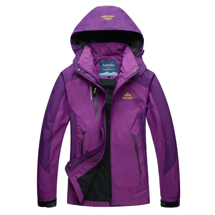 "Waterdichte outdoor jas met capuchon, unisex, blauw, wind- en waterdicht, ideaal voor avontuurlijk gebruik."