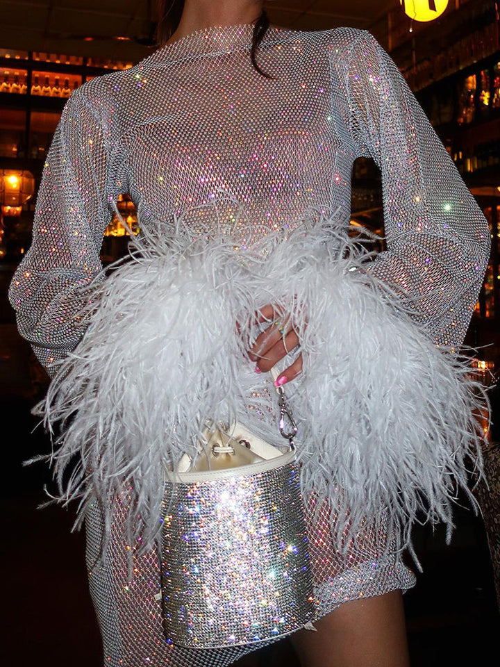 Zwarte KellysDress partyjurk, ronde hals, opvallende details. Stijlvolle korte avondjurk voor dames.