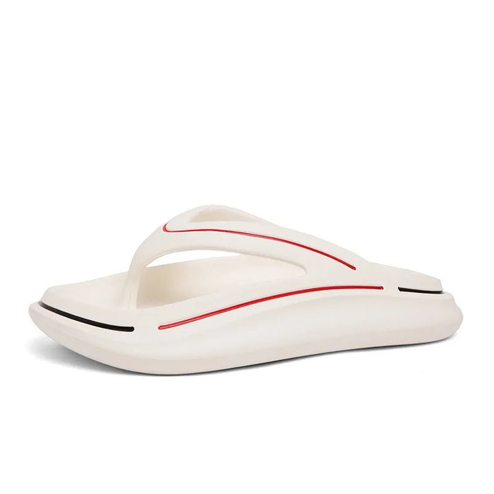 Zachte witte Jureo zomerslippers met schokabsorberende zool voor optimaal comfort. Perfect voor een relaxte zomer.