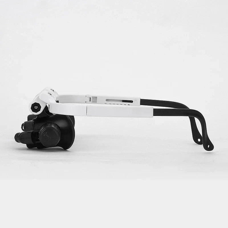 Professionele vergrootglas bril met LED-lamp en verstelbare lenzen. Essentieel voor fijnmechanica en reparatiegereedschap.