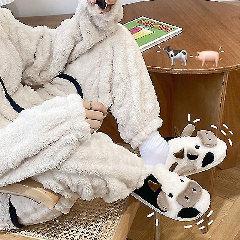 Grappige koe pantoffels voor dames, heerlijk zacht en warm. Comfortabele antislip slippers voor thuisgebruik.