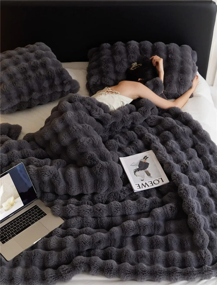 Luxe pluche fleece deken van WarmWol voor ultiem comfort en warmte.
