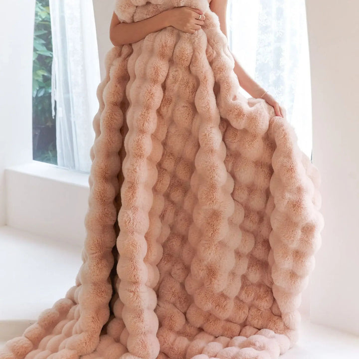 Comfortabele pluche bankdeken, perfect voor ontspanning in de woonkamer.