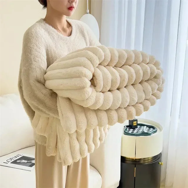 Warme koraalfleece woondeken LuxuraWrap, ideaal voor gezelligheid en comfort.