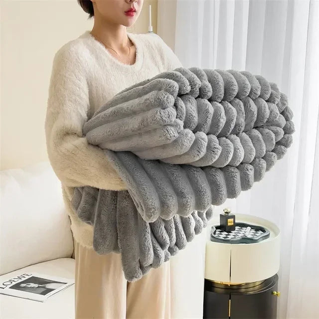 Knusse throw deken LuxuraWrap, zacht pluche voor gezelligheid in de slaapkamer.