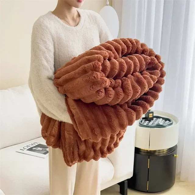 LuxuraWrap Maxi deken, perfect voor ontspanning en ultiem comfort in de woonkamer.