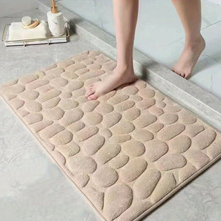 Stijlvolle en absorberende badmat met antislip laag, perfect voor moderne badkamers.
