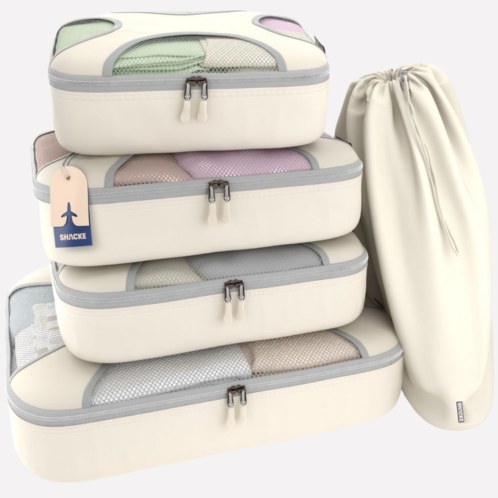 Zandkleurige 5-delige packing cube set van nylon voor georganiseerd reizen, ideaal als koffer en bagage organizer.