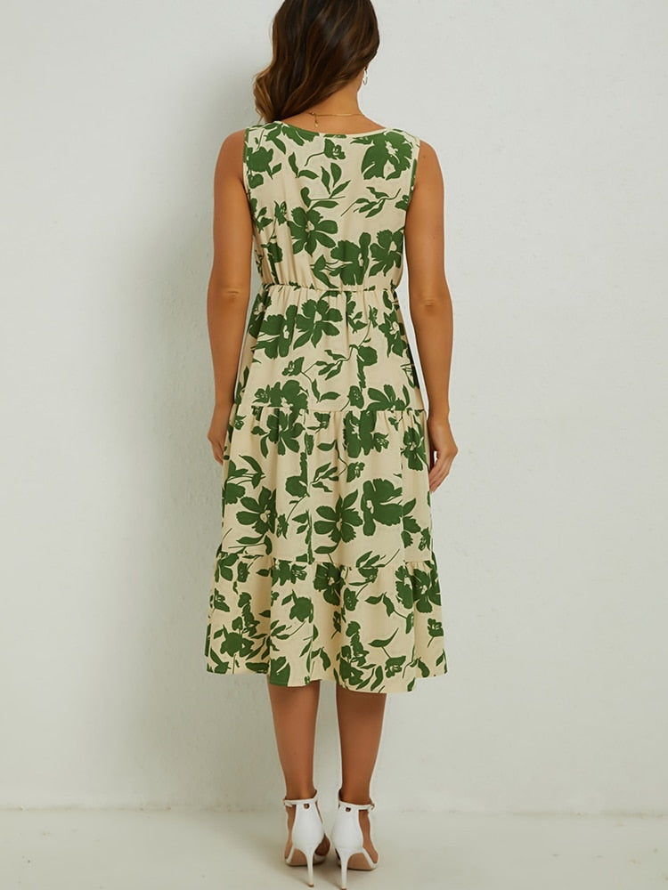 Vloeiende Fenna dames midi-jurk met levendige bloemenprint, ideaal als stijlvolle zomerjurk.