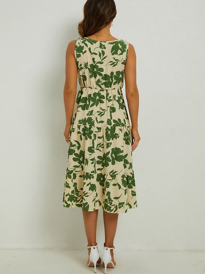 Vloeiende Fenna dames midi-jurk met levendige bloemenprint, ideaal als stijlvolle zomerjurk.