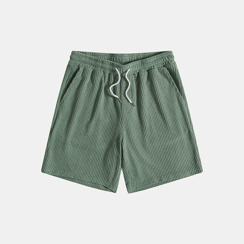 Comfortabele heren loungeset 'Lenn' in groen, met wafelstructuur poloshirt en short voor relaxte zomer.
