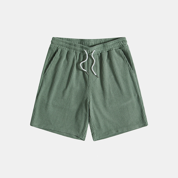 Comfortabele heren loungeset 'Lenn' in groen, met wafelstructuur poloshirt en short voor relaxte zomer.
