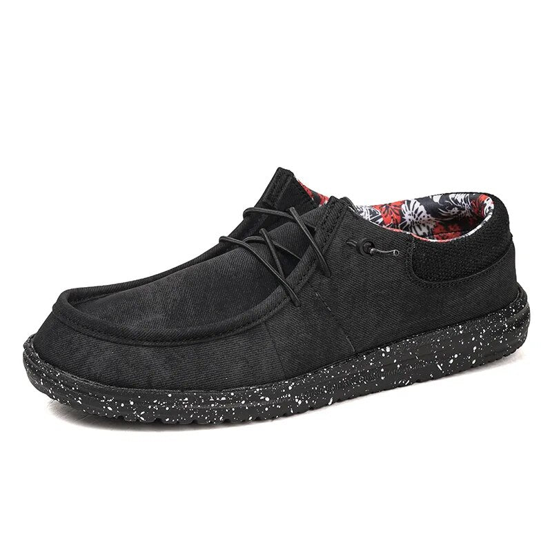 Zwarte comfortabele heren instappers, perfecte casual zomerschoenen voor mannen. Stijlvol en licht.