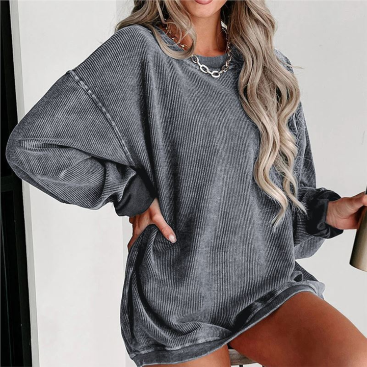 Dames oversized sweatshirt met grafische print, een trendy crewneck trui voor casual herfstmode.